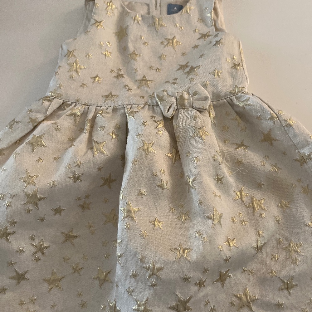 Cream colored dress with stars